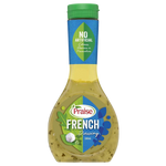 Bottle of Praise French Dressing for salads, featuring creamy texture and classic French flavor, on a grocery store shelf.
