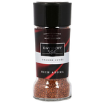 A steaming cup of Davidoff Rich Aroma Coffee in a white mug, showcasing the rich, dark brew with a smooth surface.
