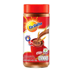 Ovaltine Classic drink in a glass with a spoon, showcasing the malted chocolate beverage by Ovaltine.