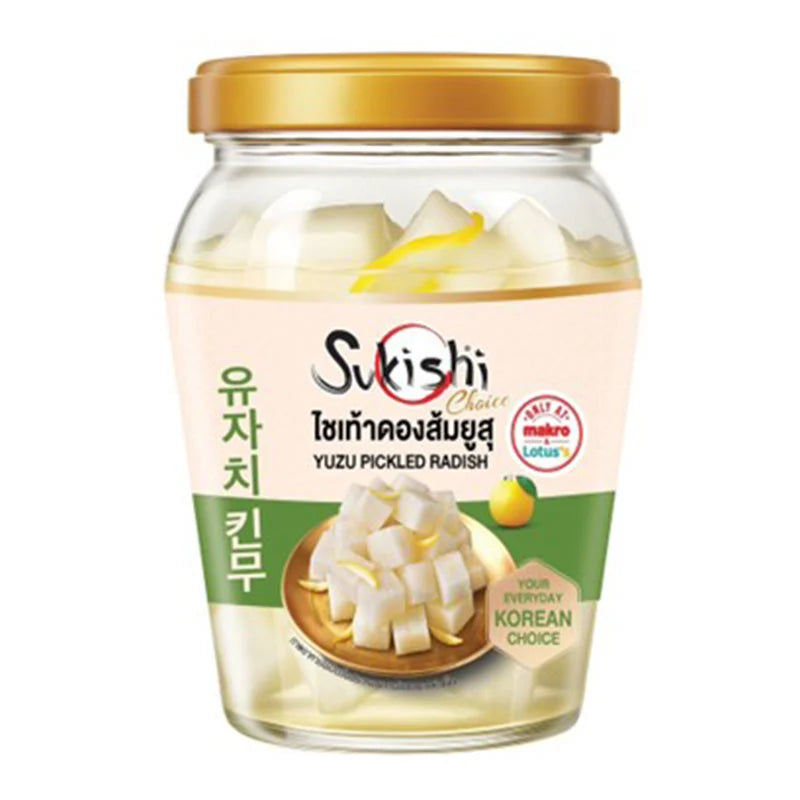 Sukishi Yuzu Pickled Radish in 500g container, showing sliced yellow radish with yuzu citrus flavor and pickling brine in the background.
