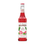 Bottle of Monin Pink Grapefruit Syrup in 700ml size, used for cocktails and beverages, with pink grapefruit flavor and branding.