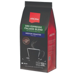 Aroma Coffee Oro Espress drink in a glass with a foamy top and rich coffee color, served in a clear glass cup.