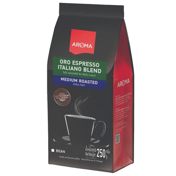 Aroma Coffee Oro Espress drink in a glass with a foamy top and rich coffee color, served in a clear glass cup.