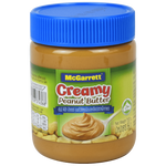Creamy McGarrett Peanut Butter jar with label, smooth texture visible, in a grocery setting.