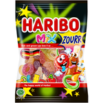 Assorted Haribo Mix Zourr confectionery snacks in colorful gummy shapes and flavors, displayed in a clear bowl.