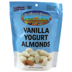 Sunridge Farms Yogurt Almonds, confectionery snack with roasted almonds coated in yogurt flavor, in a clear bowl.