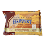 Organic Great Harvest Brown Rice in a clear bag, showing the light brown grains ready for cooking.