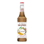Bottle of MONIN caramel syrup in 700ml plastic container, ideal for coffee, desserts, and culinary uses in dry grocery.