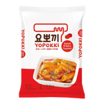 Spicy and sweet Yopokki Topokki in a grocery package, featuring Korean rice cakes with a vibrant sauce.