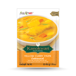 Kanokwan Yellow Curry Paste in a jar, showcasing vibrant yellow color and fresh ingredients for Thai cooking.