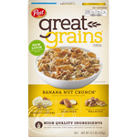 Bowl of Post Great Grains Banana Nut Crunch cereal with bananas and nuts in a white bowl on a wooden table.
