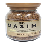 A cup of Maxim Gold Instant Coffee drink with a spoon and coffee beans on a white background.