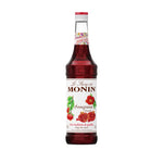 Bottle of MONIN Pomegranate Syrup 700ml for dry grocery, showing the label and clear bottle with red liquid inside.