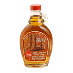 Bottle of Turkey Hill Canadian Maple Syrup with a maple leaf label on a grocery store shelf.