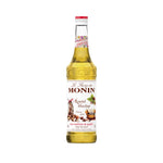 Bottle of MONIN Roasted Hazelnut Syrup for coffee and desserts, 700ml bottle, with a dark roasted hazelnut flavor.