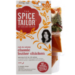 A jar of The Spice Tailor Classic Butter Chicken sauce, featuring a label with the product name and branding, on a neutral background.