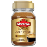 Moccona Gold Crema Smooth coffee drink in a glass cup with a creamy foam top and rich coffee color.