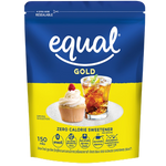 Equal Gold sweetener package showing golden-yellow packets for healthy sugar alternative in grocery aisle.