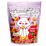 Wonder Puff Cranberry Popcorn, colorful confectionery snack with cranberry flavor and sweet puffed popcorn appearance.