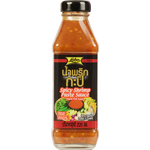 Lobo Spicy Shrimp Paste Sauce in a jar, showcasing its vibrant red color and seafood-based ingredients.
