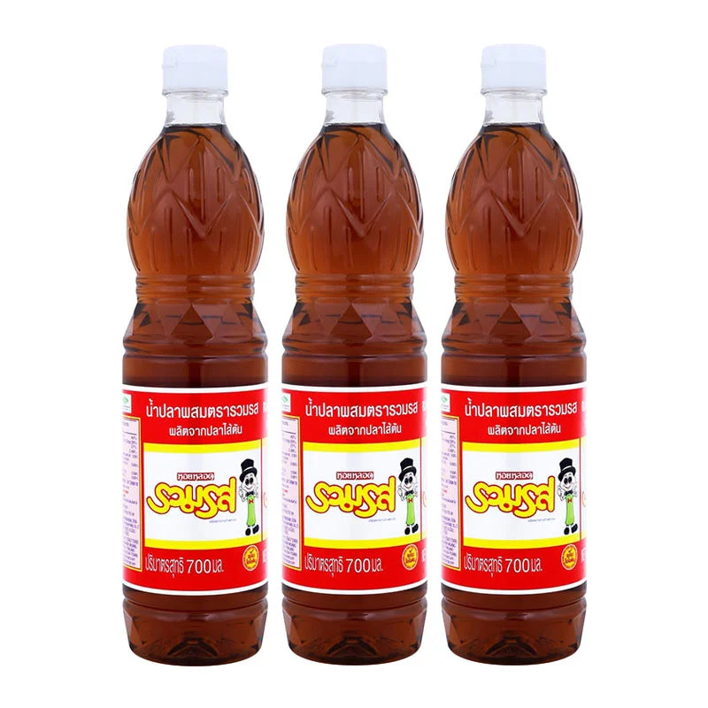 Ruamros Mix Fish Sauce 700ml bottles, showcasing clear glass bottles with dark fish sauce inside, ready for cooking or seasoning.