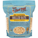 Bob's Red Mill regular rolled oats in a grocery package, showing the natural oat flakes ready for cooking or breakfast.