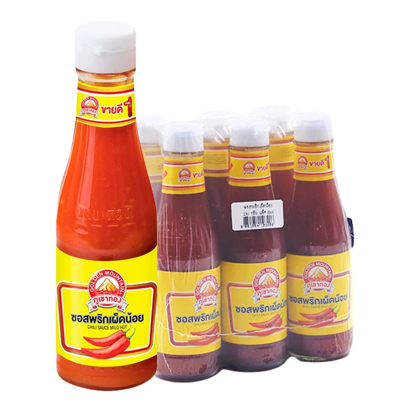 Golden Mountain Chili Sauce in 230g bottles, six-pack, showcasing vibrant red chili sauce with a golden label and Asian-inspired branding.