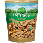 Heritage Organic Walnuts in a bowl, close-up of crunchy, natural confectionery snack with whole walnuts from Heritage brand.