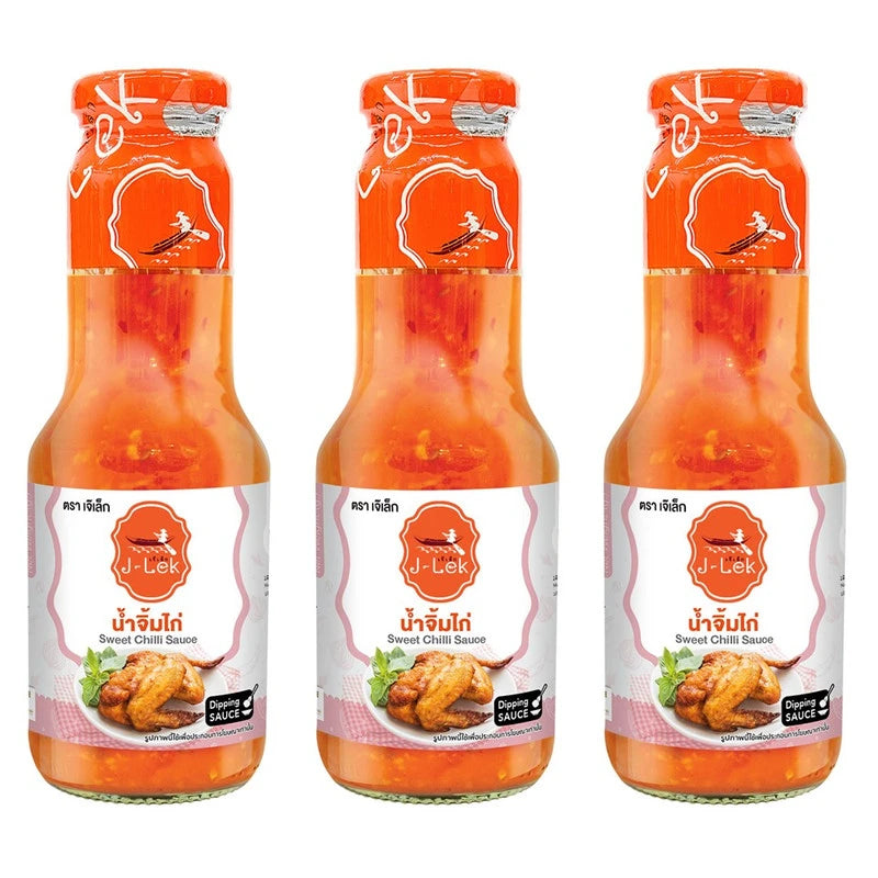 Three bottles of J-LEK Chicken Dipping Sauce, 390g each, with clear labels and golden sauce inside.