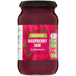 Sainsbury's seedless raspberry jam jar with red jam visible through clear glass, label showing raspberry images and product details.