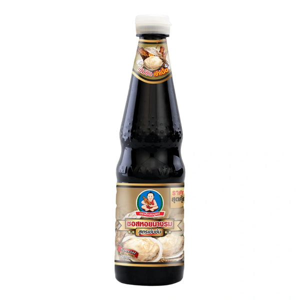 Bottle of DEKSOMBOON Thick Oyster Sauce in 670g jar, showing the dark, rich sauce with a label on the front.