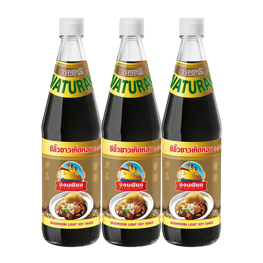 NGUAN CHIANG Mushroom Sauce 700g bottle, showing the dark, rich sauce in a clear glass jar with a red and white label.