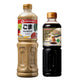 YAMAMORI Roasted Sesame Salad Dressing and Moo Kra Ta Dipping Sauce bottles, 1L and 500ml, with labels and sauce near the bottles