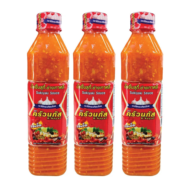 KRUANAPAT Spicy Suki Sauce in a 560g bottle, shown in a set of three, with a rich red color and Thai-style packaging.