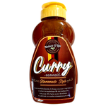 Bottle of Nature D'Lite Curry Sauce with label visible, featuring rich, golden curry sauce in a grocery store setting.