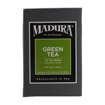 Madura green tea tea bags for brewing, featuring vibrant green tea leaves in a clear package.