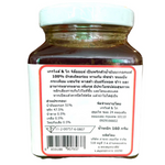 Cravings & Co Chili in Olive Oil jar with red chili peppers and olive oil, ideal for cooking and garnishing dishes.