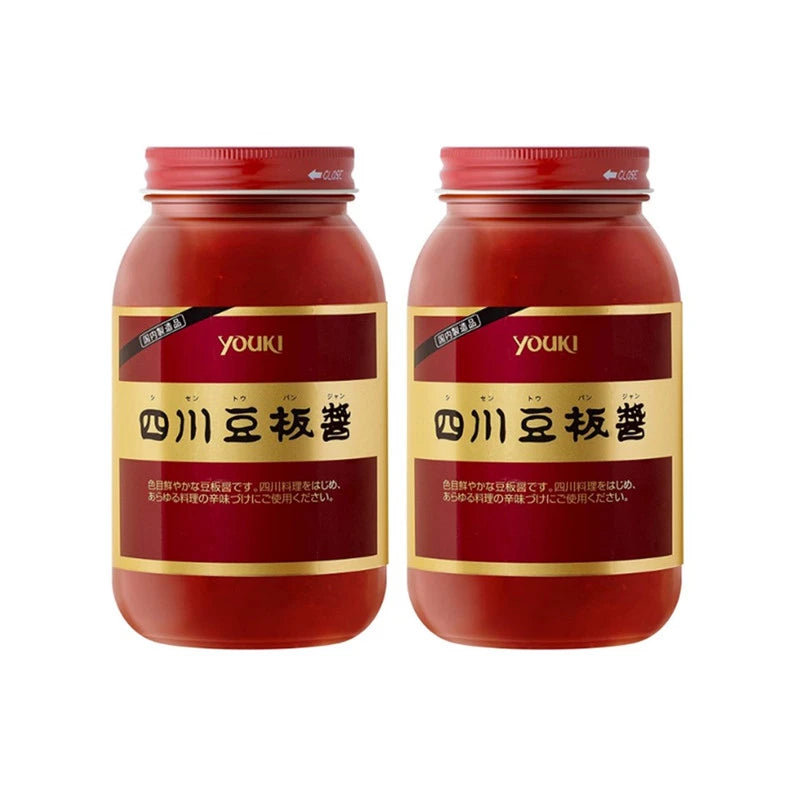 YOUKI Sichuan Chilli Miso Doubanjiang sauce bottles with chilli and broad beans, 1kg each, in clear plastic bottles.