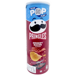 Pringles Smokey Bacon snack chips in a can, showing crispy potato chips with smoky bacon flavor.