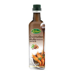 Raitip Tamarind Paste jar showing smooth, dark tamarind paste inside, ideal for cooking and flavoring dishes.
