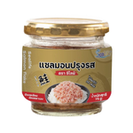Sealife Salmon Flake used as a grocery ingredient, showing golden salmon flakes in a clear container.