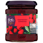 Sainsbury's Taste The Difference raspberry conserve jar showing the label and fresh raspberries on the packaging.