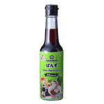 Kikkoman Ponzu Dipping Sauce bottle with label, showcasing Japanese citrus-flavored soy sauce for salads and dishes.