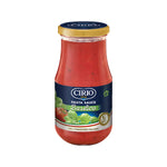 Cirio Pasta Sauce Basilico in a glass jar, with fresh basil and tomato ingredients visible, ideal for Italian dishes.