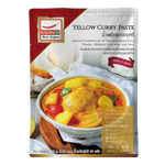 Mae Supen Yellow Curry Paste in a jar, showcasing vibrant yellow color and fresh ingredients for Thai cuisine.