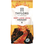 Taylors Hot Lava Java roasted coffee drink in a clear glass cup with dark coffee and a frothy top, ready to enjoy.