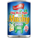 Cans of Batchelors Chip Shop Style Mushy Peas packed in a grocery store display, ready for cooking and serving.