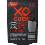 Xo Cube Freeze Dried Coffee Americano drink in a clear glass, showcasing the dark coffee liquid with ice cubes inside.
