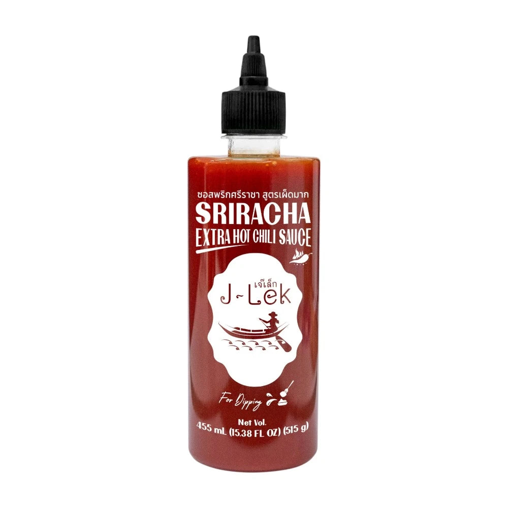 J-LEK Sriracha Chili Sauce Extra Spicy 455ml bottle with red chili peppers and sauce drizzling from the top.