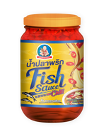 Deksomboon Chili Fish Sauce 250g bottle, Thai dry grocery condiment with red chili and fish flavors, in a clear glass bottle
